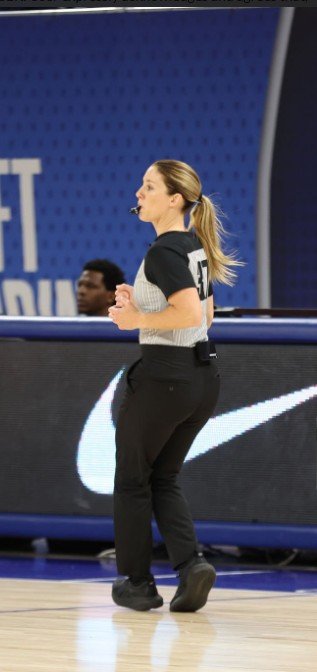Leah Lanie officiating a women's basketball game
